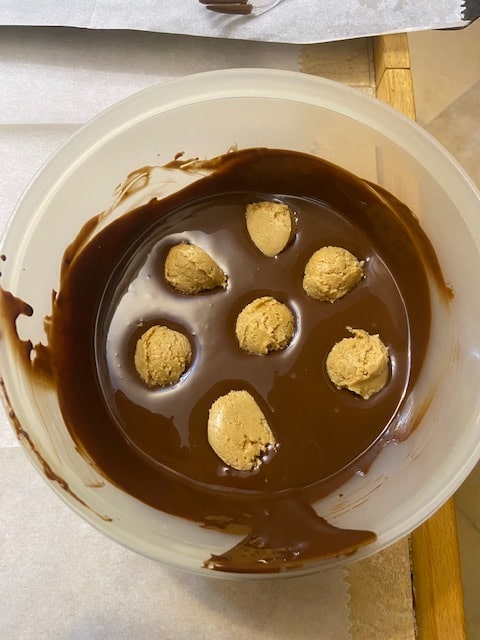 dippable chocolate with peanut filling balls