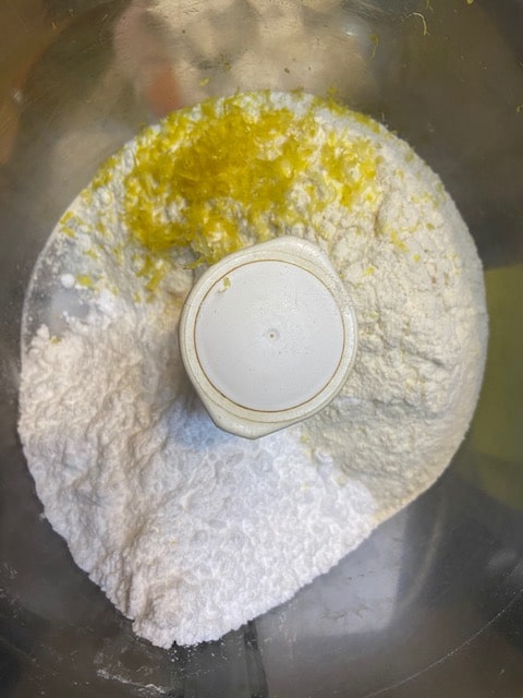 add the grated lemon peel and the egg