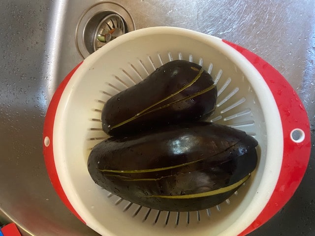 eggplants dripping out bitter juices