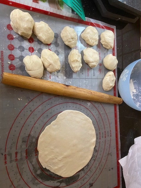 rolling out the tortillas