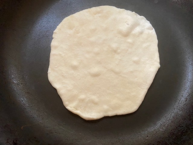 Tortilla round in frying pan