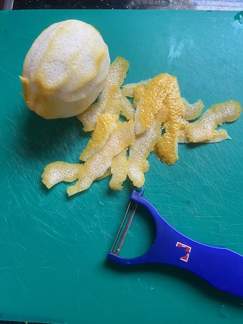peeling off strips of peel