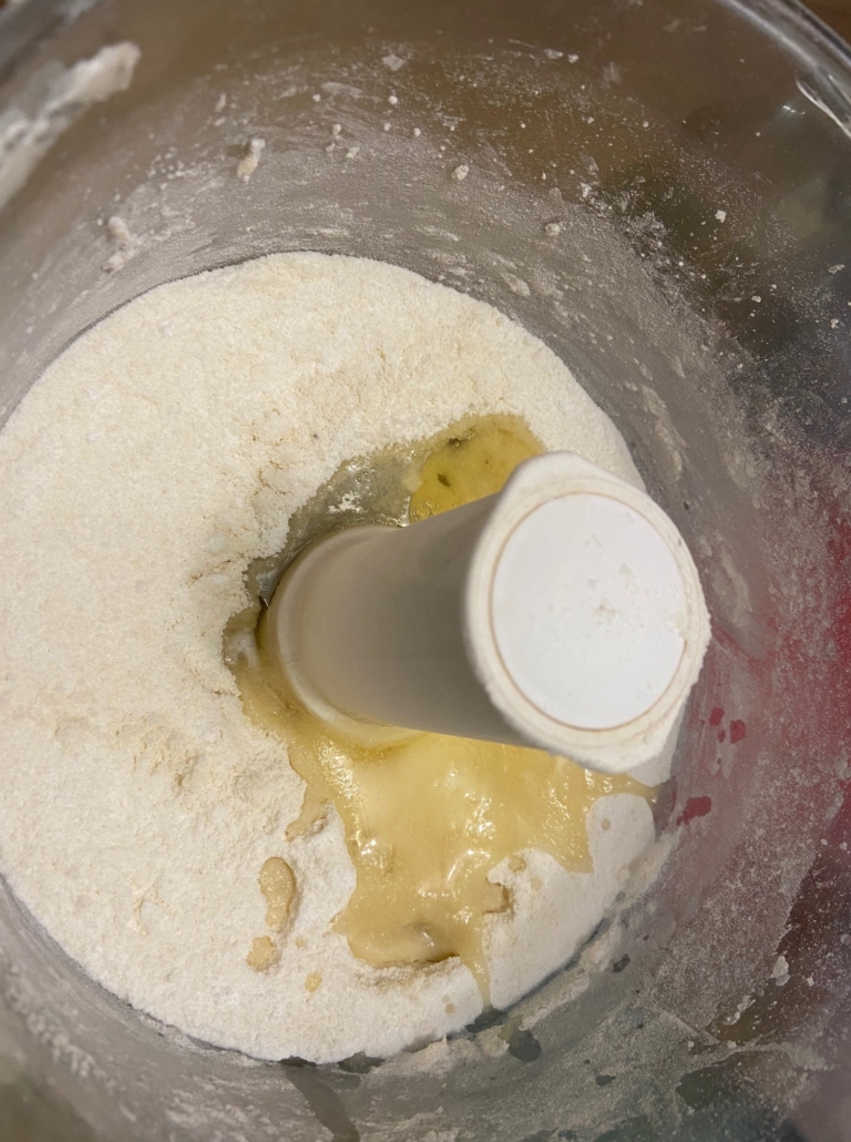 mixing the almond flour and powdered sugar