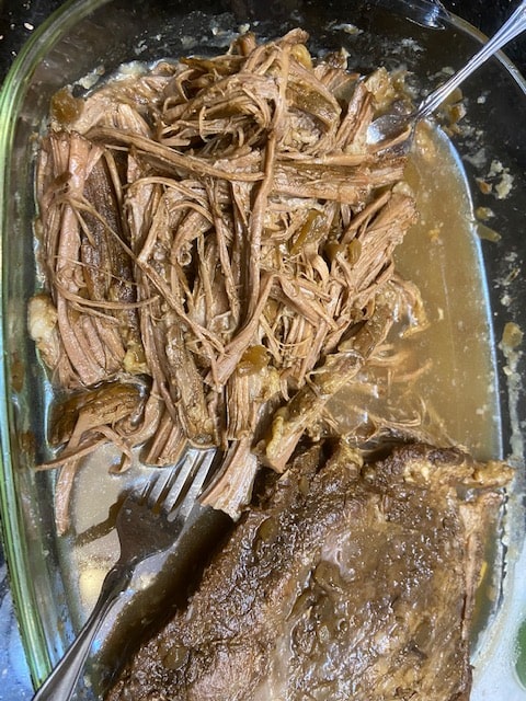 shredding the brisket