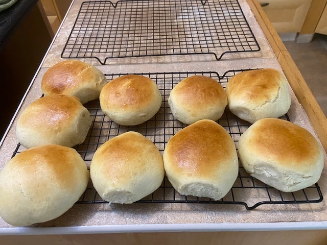 hamburger buns cooling on racks