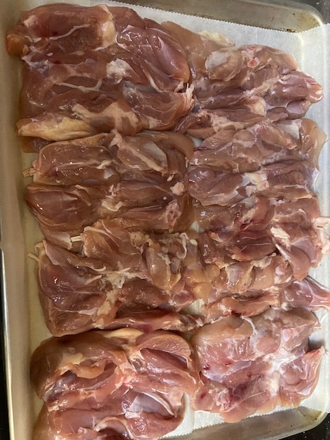 chicken on baking sheet