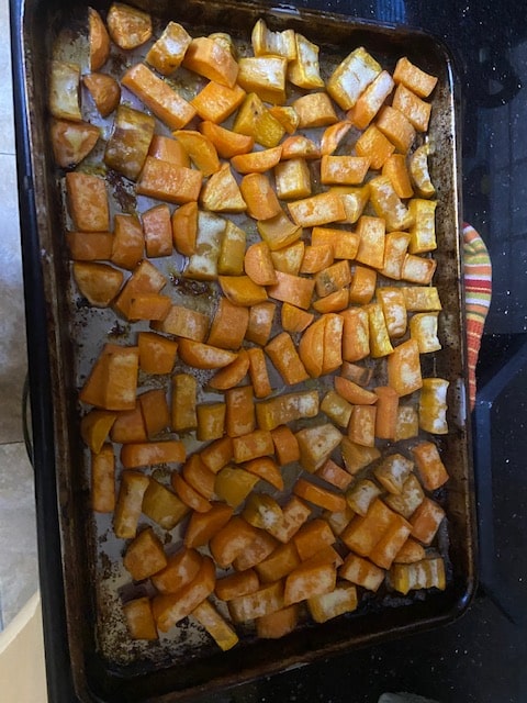 tossing sweet potatoes in mild oil