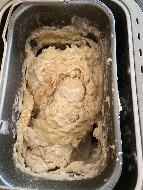 mixing dough in breadmaker