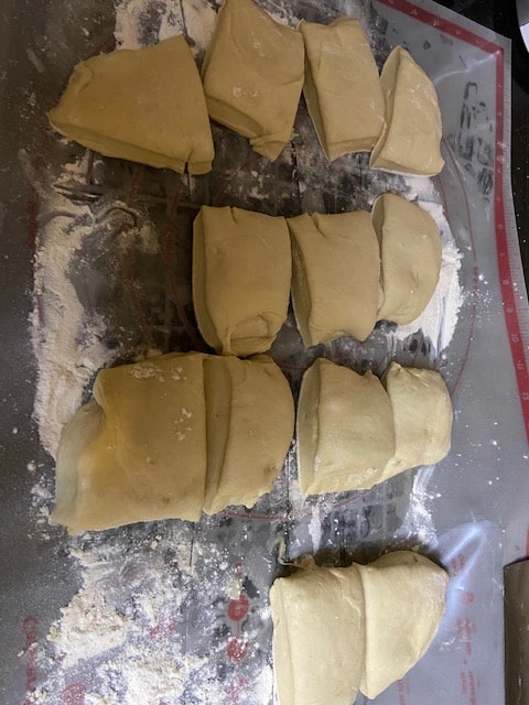 cutting the dough into equal pieces
