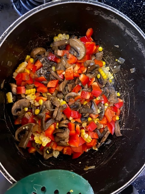 sauteeing the veggies