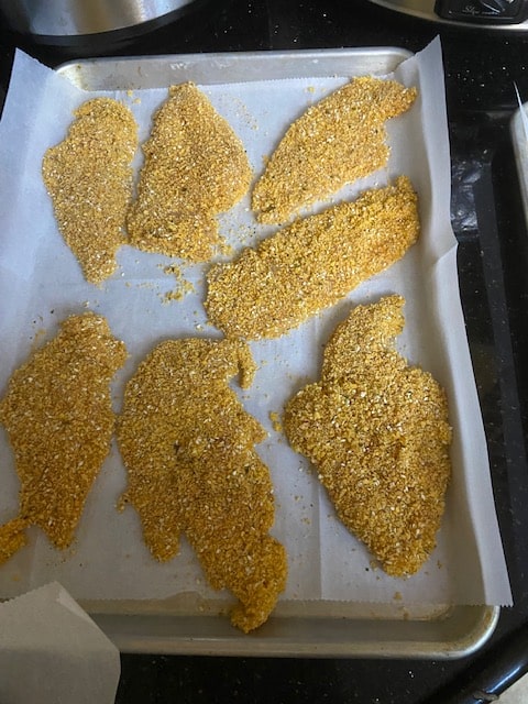 shnitzel waiting to go into the oven