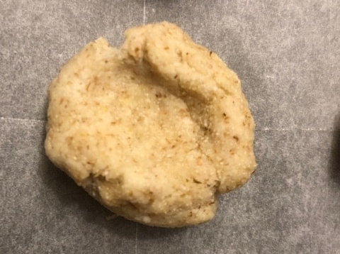 making a depression in the dough