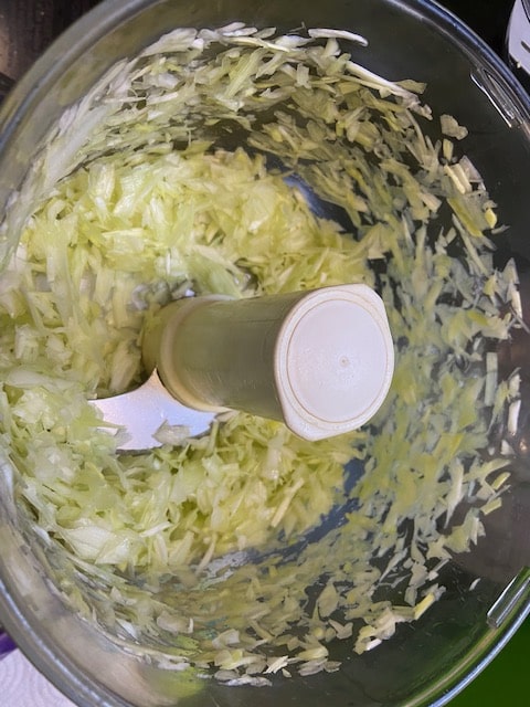 chopping the leeks in the food processor