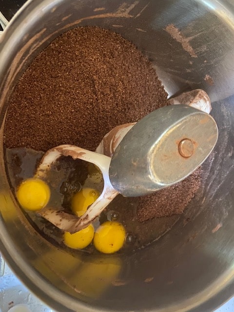 brownie mix, vanilla and eggs in bowl
