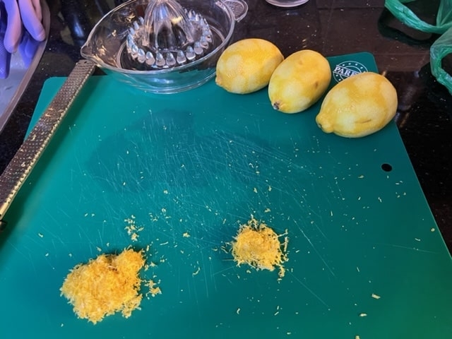 grating the lemon peel