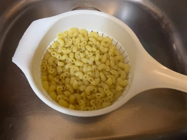 draining the macaroni