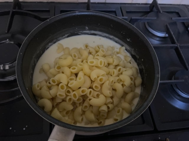 adding the macaroni