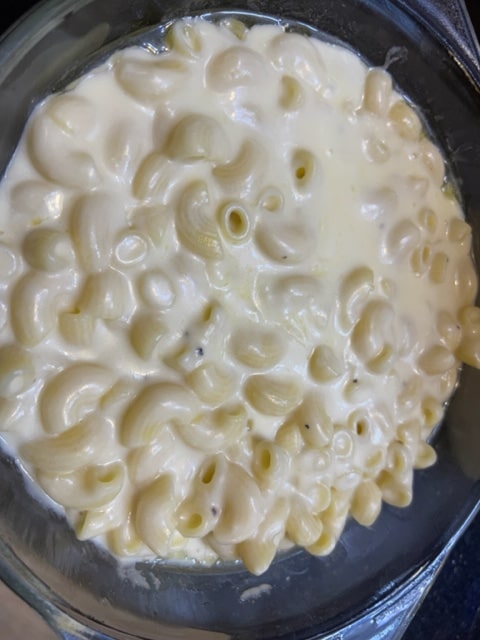 coated macaroni in greased casserole dish