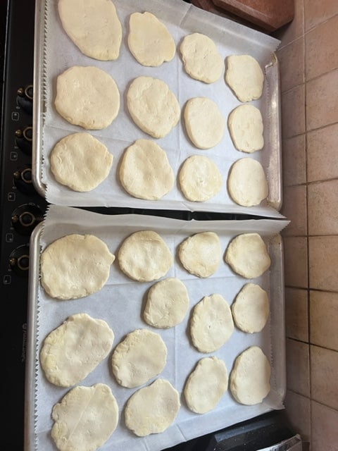 prepared rounds of pizza dough