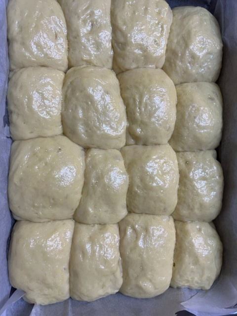 egg wash brushed and risen rolls