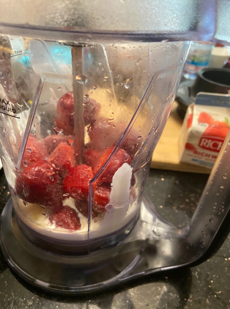 putting the ingredients in the blender