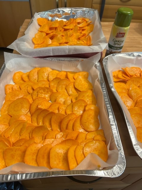 preparing the sweet potato chips with oil