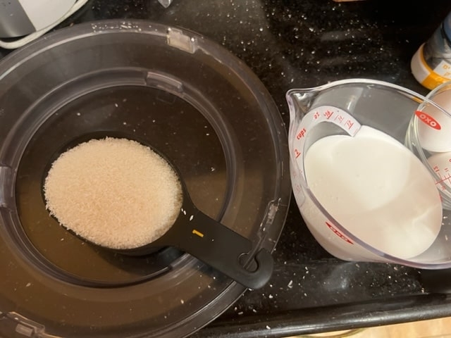 adding the coconut to the coconut cream