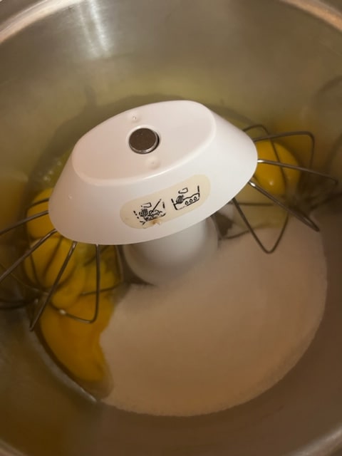 beating eggs and sugar together
