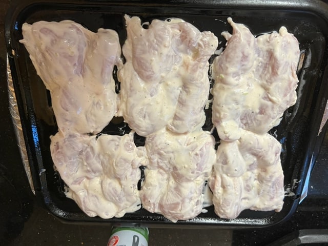 placing chicken on broiler pan