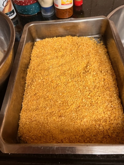 crushed cornflakes in pan