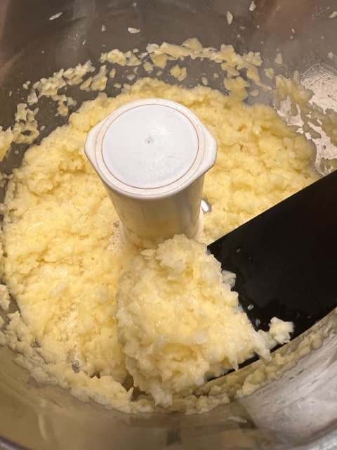 after adding second egg.  Smaller pieces and smoother but still a chopped texture not slush