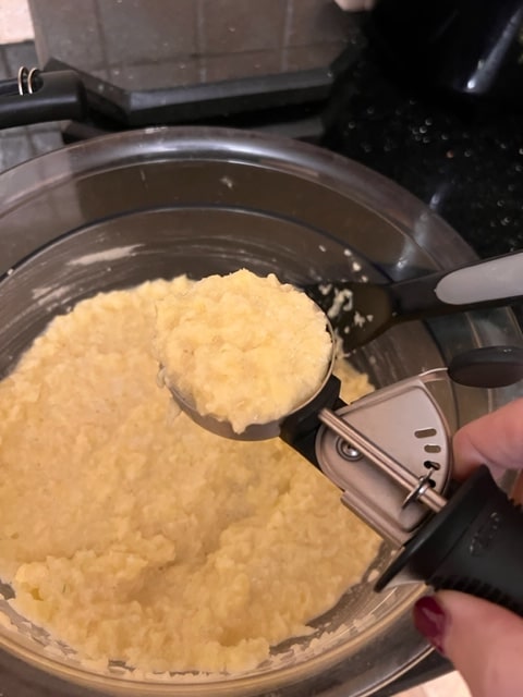 scoop up the mixture either in an ice cream scooper or a 1/3 cup measuring cup