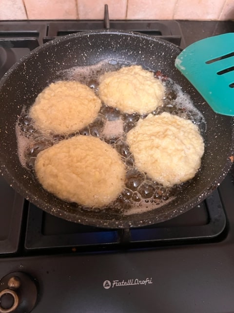 latkes bubbling in oil