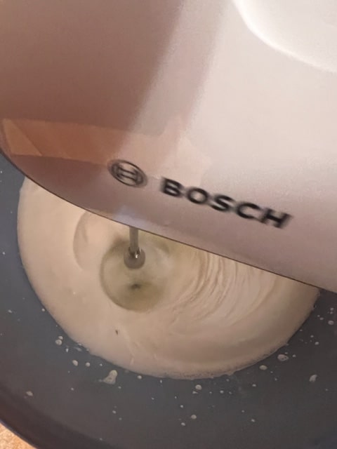 whipping the cream with the sugar