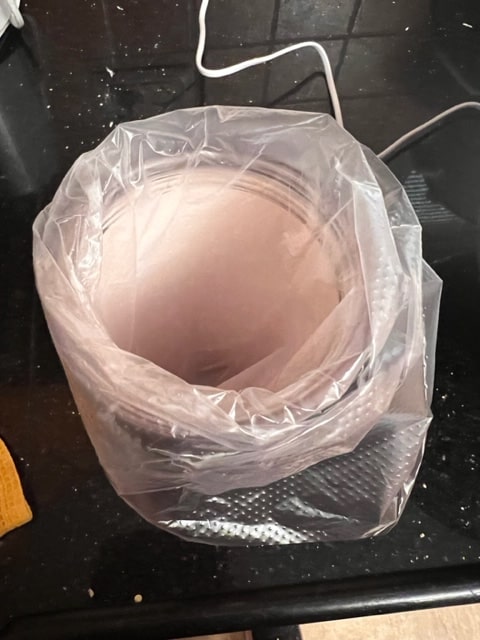 place bag over cup 