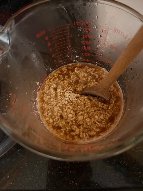 pour the boiling water over the oats and coffee