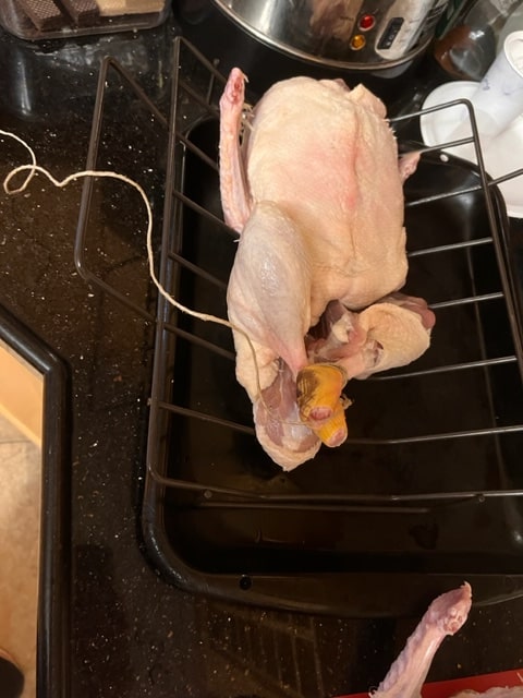 trussing (tying up) the duck