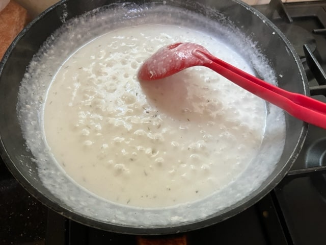 cooking the coconut cream sauce till slightly thickened