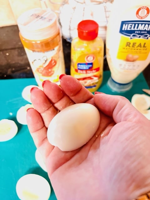 turn egg half over into your palm