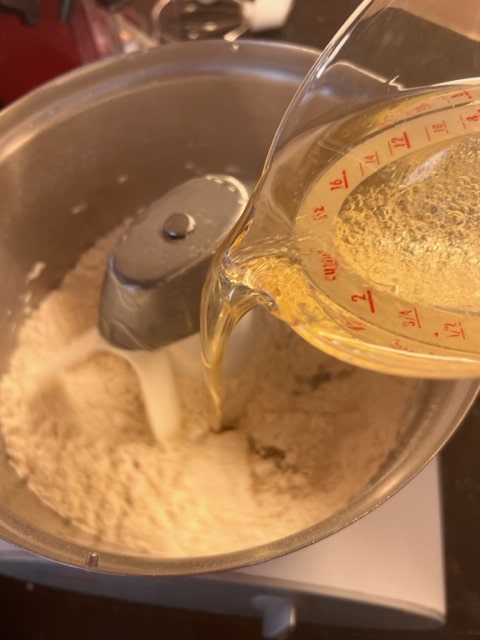 add the oil and water