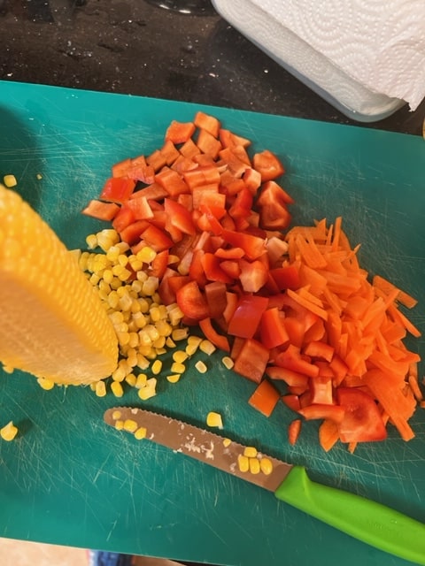 cut the corn off the ears