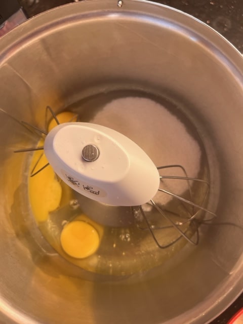 put eggs and sugar in mixer