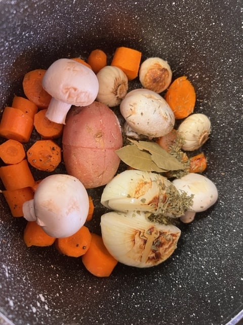 adding mushrooms and potato