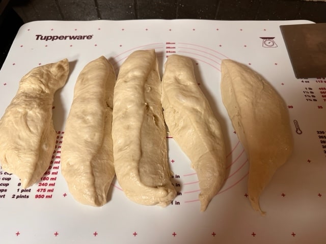 cutting the dough into 5