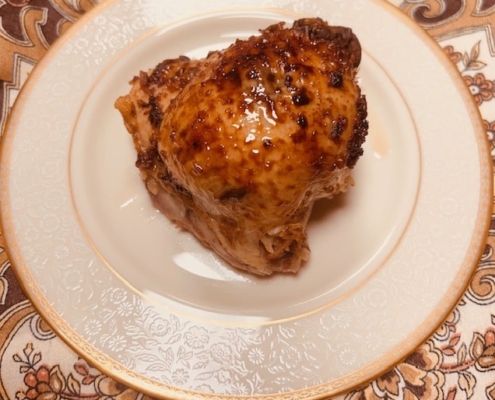 Rice stuffed chicken thighs in honey pomegranate sauce