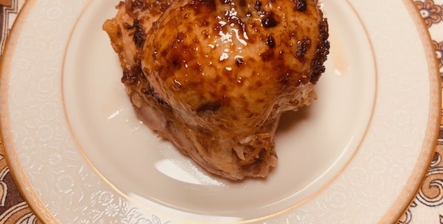 Rice stuffed chicken thighs in honey pomegranate sauce