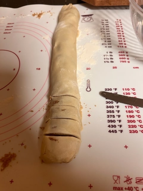rolled dough with cuts in dough