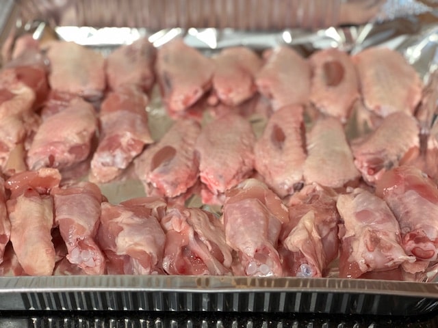 wings on foil lined baking sheet