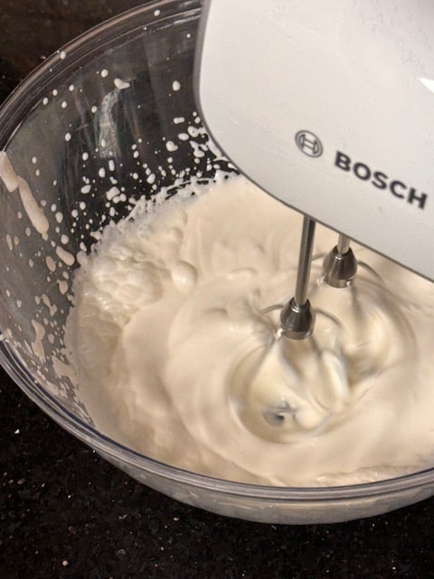 starting to whip sugar and cream