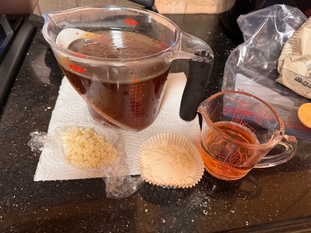 quick peek. I lined up the chopped garlic, flour, broth, wine and water at the ready